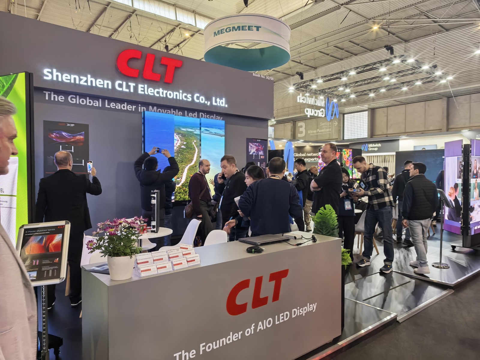 Visitors Surrounding CLT Movable Display